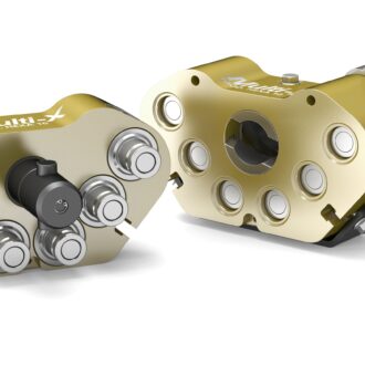 Ryhmäliitin hydrauliletkujen asennukseen